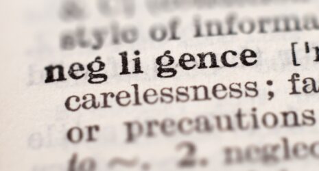 Dictionary definition of word negligence, selective focus. Concept of what are the four types of negligence
