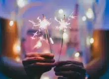 Teenage girl holding a fireworks.