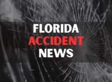 Glass broken cracks splinters in front of car.