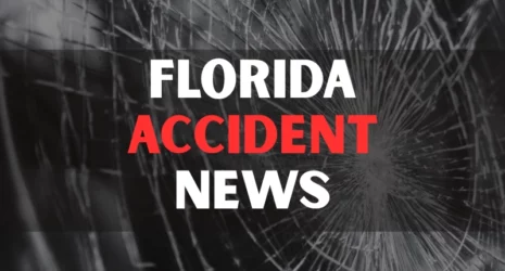 Glass broken cracks splinters in front of car.