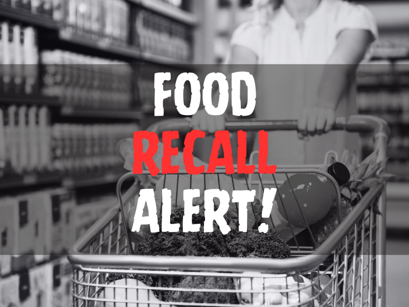 Cropped image of woman pushing trolley in aisle in supermarket with food recall alert texts.