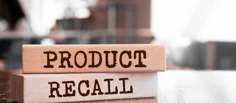 Wooden blocks with words 'Product Recall'.