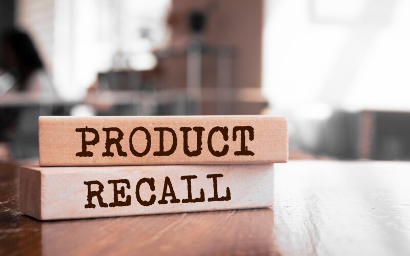 Wooden blocks with words 'Product Recall'.