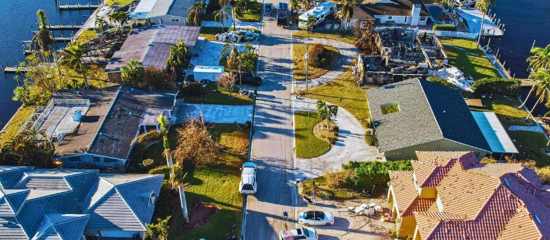 Aerial view of damaged homes after hurricane