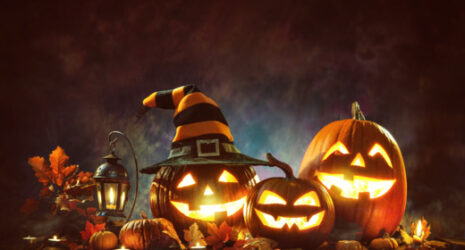 Halloween pumpkins in a dark night