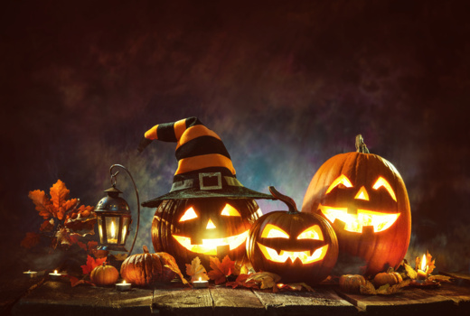 Halloween pumpkins in a dark night